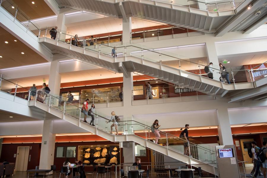 Beloit College students change classes in the Sanger Center for the Sciences atrium.